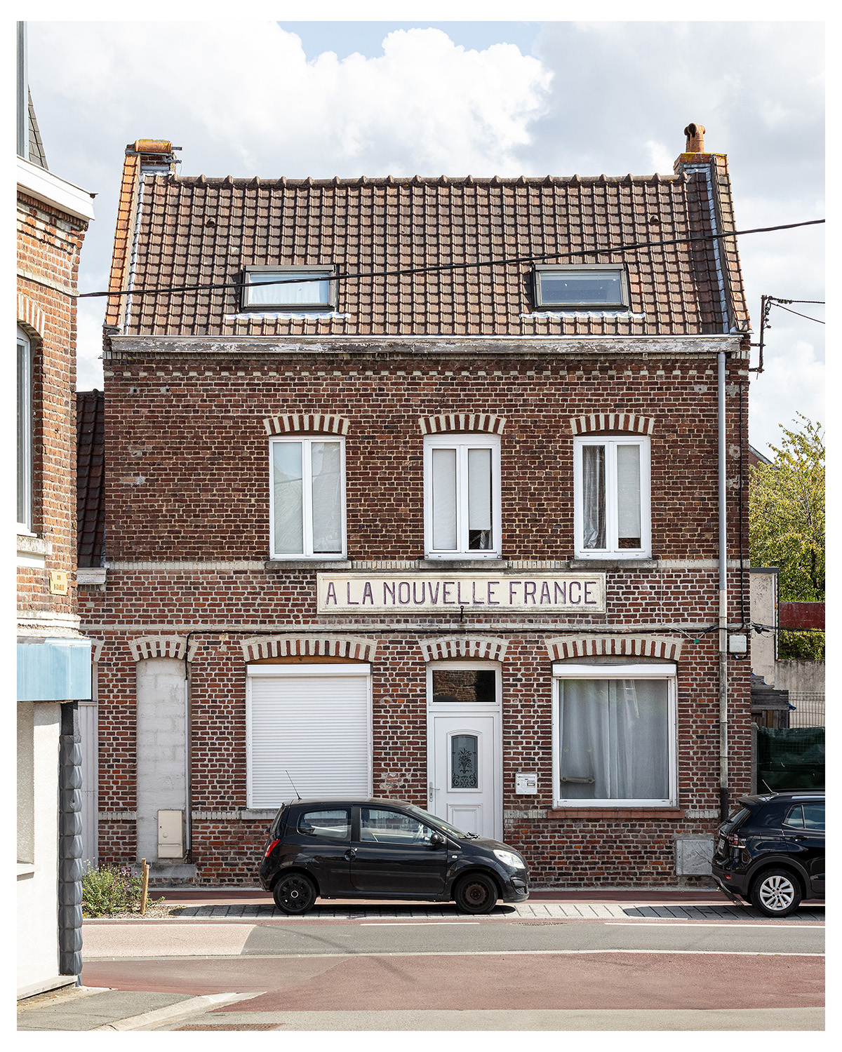 Photographie d'architecture et de patrimoine, Lille, Nord, Hauts-de-France. Ancien commerce à Houplines ©Thomas Karges
